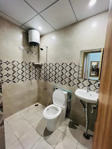 Attached washroom with geyser